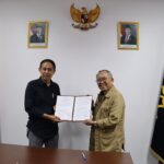 Ketua Lembaga Manajemen Kolektif Nasional (LMKN) Pencipta, Andi Mulhanan Tombolotutu (Kanan)
